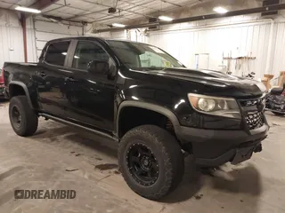 2017 Chevrolet Colorado 4WD ZR2 z VIN 1GCGTEEN7H1265186, wystawiony jako IAAI lot #40316276 z przebiegiem 93 424 mil mil oraz . Historia ofert i sprzedaży dostępna na DreamBid. Obrazek 1.