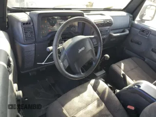 2005 Jeep Wrangler Rubicon with VIN 1J4FA69S05P351725, listed as a Copart auction lot 71411904 with 144,557 mi miles and Salvage Title. Bid and sale history available at carsss.com. Image 8.