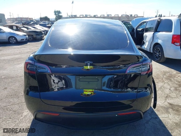 2024 Tesla Model Y with VIN 7SAYGDED6RF152657, listed as a IAAI auction lot 41265862 with NaN miles. Bid and sale history available at carsss.com. Image 16.