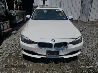 2014 BMW 3 Series 320i xDrive with VIN WBA3C3C51EF983592, listed as a Copart auction lot 60608765 with 195,061 mi miles and Salvage title. Bid and sale history available at DreamBid. Image 5.