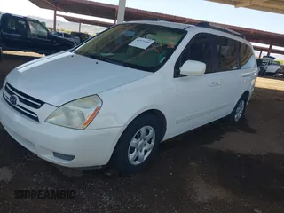 2007 Kia Sedona EX with VIN KNDMB233276111265, listed as a IAAI auction lot 41973188 with 197,754 mi miles. Bid and sale history available at carsss.com. Image 2.