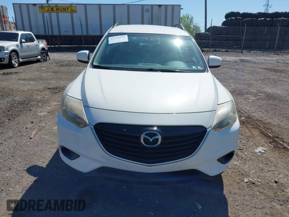 2015 Mazda CX-9 Touring with VIN JM3TB3CV1F0461403, listed as a IAAI auction lot 42148325 with 143,452 mi miles. Bid and sale history available at carsss.com. Image 12.