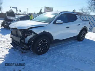 2024 Hyundai Santa Cruz SEL z VIN 5NTJCDAE2RH093666, wystawiony jako IAAI lot #41639659 z przebiegiem 28 599 mil mil oraz . Historia ofert i sprzedaży dostępna na DreamBid. Obrazek 2.