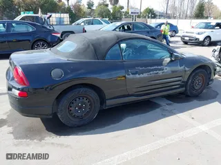 2001 Mitsubishi Eclipse GT with VIN 4A3AE85H61E129879, listed as a IAAI auction lot 41619874 with 132,493 mi miles. Bid and sale history available at carsss.com. Image 4.