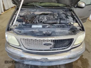2003 Ford F-150 XL with VIN 1FTRX17283NA46215, listed as a Copart auction lot 85194094 with 168,415 mi miles and Salvage title. Bid and sale history available at DreamBid. Image 13.