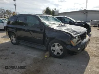 2003 Chevrolet TrailBlazer LTZ with VIN 1GNDT13S332196883, listed as a Copart auction lot 77031124 with 167,328 mi miles and Salvage Title. Bid and sale history available at DreamBid. Image 4.
