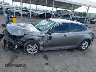 2018 Kia Optima LX z VIN 5XXGT4L38JG228380, wystawiony jako IAAI lot #41960308 z przebiegiem 43 317 mil mil oraz . Historia ofert i sprzedaży dostępna na DreamBid. Obrazek 14.
