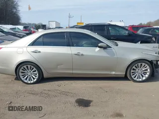 2015 Cadillac CTS Performance AWD with VIN 1G6AY5S35F0110281, listed as a IAAI auction lot 41670400 with 103,121 mi miles and . Bid and sale history available at DreamBid. Image 14.