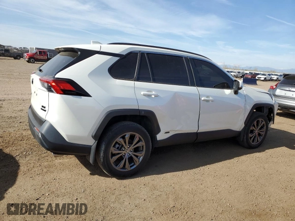 2022 Toyota RAV4 Hybrid XLE Premium with VIN JTMB6RFV1ND521761, listed as a Copart auction lot 54263055 with 46,391 mi miles and Salvage title. Bid and sale history available at DreamBid. Image 3.