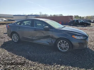 2019 Ford Fusion SE with VIN 3FA6P0HD9KR158973, listed as a Copart auction lot 50158435 with 76,956 mi miles and Salvage Title. Bid and sale history available at DreamBid. Image 4.