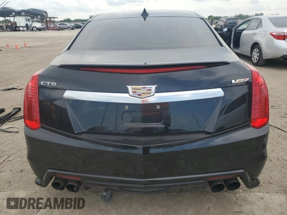 2016 Cadillac CTS-V z VIN 1G6A15S62G0100744, wystawiony jako Copart lot #66129504 z przebiegiem 24 608 mil mil oraz Tytuł czysty. Historia ofert i sprzedaży dostępna na DreamBid. Obrazek 6.