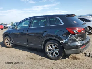 2014 Mazda CX-9 Sport with VIN JM3TB2BV6E0431971, listed as a Copart auction lot 63778635 with 136,287 mi miles and Salvage title. Bid and sale history available at DreamBid. Image 2.
