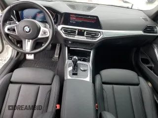 2021 BMW 3 Series 330i xDrive z VIN 3MW5R7J05M8B93077, wystawiony jako Copart lot #57125755 z przebiegiem 43 123 mil mil oraz Szkoda całkowita • Salvage title. Historia ofert i sprzedaży dostępna na DreamBid. Obrazek 8.