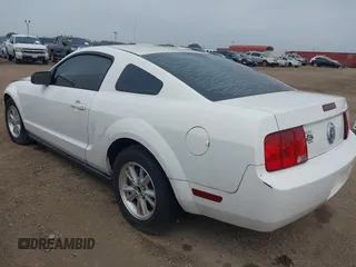 2007 Ford Mustang Deluxe with VIN 1ZVFT80N875359456, listed as a IAAI auction lot 42205108 with 75,588 mi miles and . Bid and sale history available at carsss.com. Image 3.