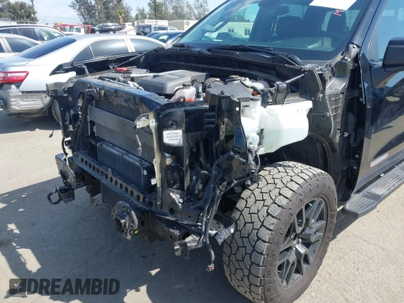 2022 GMC Sierra 1500 with VIN 1GTUUCET2NZ586441, listed as a IAAI auction lot 41957483 with 68,095 mi miles and . Bid and sale history available at DreamBid. Image 6.