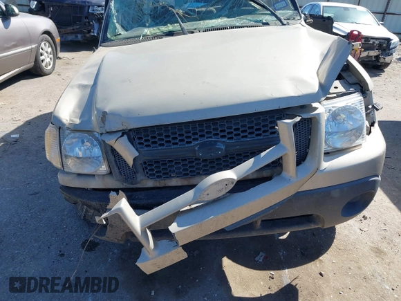 2004 Ford Explorer Sport Trac XLS z VIN 1FMZU67K74UC30067, wystawiony jako IAAI lot #41680436 z przebiegiem Nie podano mil oraz . Historia ofert i sprzedaży dostępna na DreamBid. Obrazek 11.