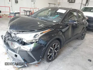2020 Toyota C-HR LE with VIN JTNKHMBX1L1077957, listed as a IAAI auction lot 42159765 with 83,138 mi miles and . Bid and sale history available at DreamBid. Image 18.