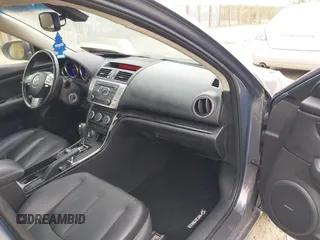 2009 Mazda 6 S Grand Touring with VIN 1YVHP82B295M06383, listed as a IAAI auction lot 42079585 with 109,008 mi miles and . Bid and sale history available at DreamBid. Image 5.