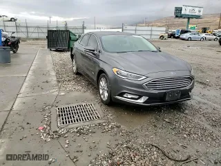 2017 Ford Fusion Energi Titanium with VIN 3FA6P0SUXHR329621, listed as a Copart auction lot 86553834 with 122,073 mi miles and Salvage Title. Bid and sale history available at carsss.com. Image 11.