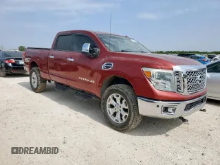 2016 Nissan Titan SL z VIN 1N6BA1F4XGN500750, wystawiony jako Copart lot #57608135 z przebiegiem 126 525 mil mil oraz Czysty tytuł • Clean title. Historia ofert i sprzedaży dostępna na DreamBid. Obrazek 4.