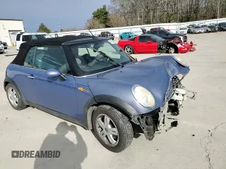 2005 MINI Convertible with VIN WMWRF33555TF62593, listed as a Copart auction lot 48305985 with 172,839 mi miles and Salvage title. Bid and sale history available at DreamBid. Image 11.