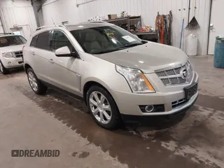2014 Cadillac SRX Premium Collection с VIN 3GYFNGE31ES523917, выставлен на аукционе IAAI как лот 42289371 с пробегом 122 949 миль миль и . История ставок и продаж доступна на DreamBid. Изображение 1.