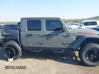 2022 Jeep Gladiator Mojave with VIN 1C6JJTEGXNL155838, listed as a IAAI auction lot 41968917 with 54,495 mi miles and . Bid and sale history available at DreamBid. Image 14.
