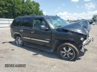 2005 GMC Yukon SLE with VIN 1GKEC13T35R233595, listed as a Copart auction lot 64571554 with 0 mi miles and Salvage Title. Bid and sale history available at carsss.com. Image 4.