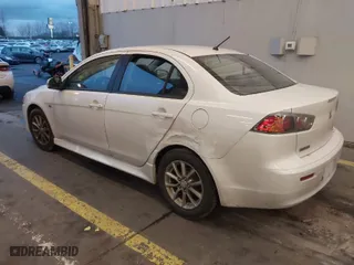 2016 Mitsubishi Lancer ES with VIN JA32U2FU7GU003157, listed as a IAAI auction lot 41279548 with 111,831 mi miles. Bid and sale history available at carsss.com. Image 3.