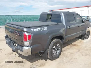 2023 Toyota Tacoma SR with VIN 3TMCZ5AN0PM636306, listed as a IAAI auction lot 42255935 with 14,131 mi miles and . Bid and sale history available at DreamBid. Image 4.