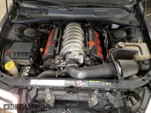 2006 Chrysler 300 C SRT8 with VIN 2C3LA73WX6H106631, listed as a Copart auction lot 50715715 with 104,990 mi miles and Clean Title. Bid and sale history available at carsss.com. Image 12.