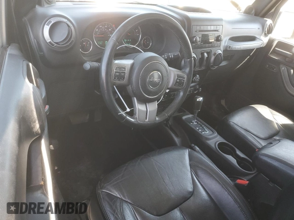 2013 Jeep Wrangler Sahara with VIN 1C4AJWBG8DL602065, listed as a Copart auction lot 52082535 with 110,727 mi miles and Salvage title. Bid and sale history available at DreamBid. Image 8.