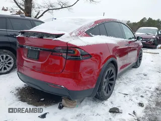 2023 Tesla Model X with VIN 7SAXCBE51PF404297, listed as a IAAI auction lot 41314595 with 25,020 mi miles and . Bid and sale history available at DreamBid. Image 4.