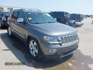 2013 Jeep Grand Cherokee Overland with VIN 1C4RJFCG2DC611877, listed as a IAAI auction lot 41910800 with 151,457 mi miles. Bid and sale history available at carsss.com. Image 1.