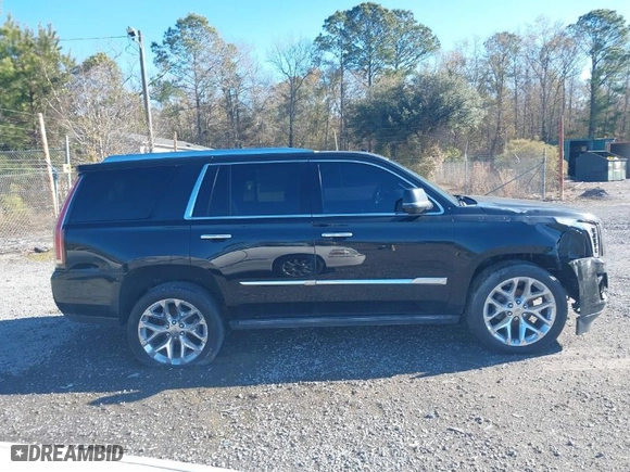 2016 Cadillac Escalade Platinum with VIN 1GYS4DKJ5GR305102, listed as a IAAI auction lot 39906183 with 133,432 mi miles. Bid and sale history available at carsss.com. Image 13.