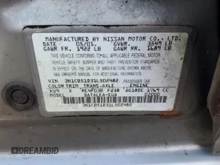 2001 Nissan Sentra GXE with VIN 3N1CB51D31L502482, listed as a Copart auction lot 50762195 with 185,455 mi miles and Salvage title. Bid and sale history available at DreamBid. Image 12.