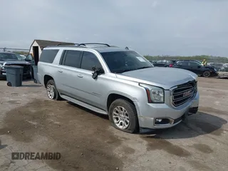 2015 GMC Yukon XL SLT with VIN 1GKS2HKC9FR249009, listed as a IAAI auction lot 42071672 with 145,184 mi miles and . Bid and sale history available at DreamBid. Image 1.