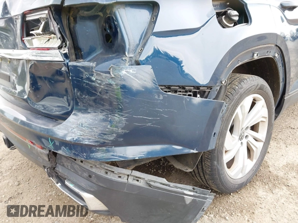 2021 Volkswagen Atlas SE z VIN 1V2WR2CA7MC568779, wystawiony jako IAAI lot #42132709 z przebiegiem 51 205 mil mil oraz . Historia ofert i sprzedaży dostępna na DreamBid. Obrazek 6.