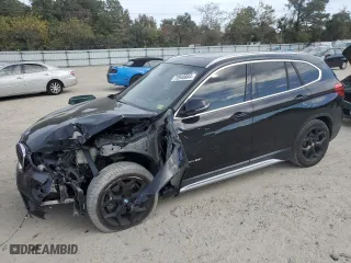 2016 BMW X1 xDrive28i with VIN WBXHT3C33G5F64682, listed as a Copart auction lot 78940864 with 64,377 mi miles and Salvage Title. Bid and sale history available at carsss.com. Image 1.