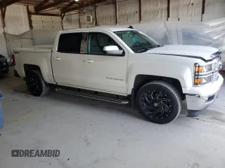 2015 Chevrolet Silverado 1500 LT with VIN 3GCUKREC6FG464613, listed as a Copart auction lot 51180085 with 93,304 mi miles and Salvage Title. Bid and sale history available at DreamBid. Image 4.