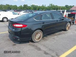 2014 Ford Fusion Titanium с VIN 3FA6P0K94ER279449, выставлен на аукционе IAAI как лот 42403266 с пробегом 253 998 миль миль и . История ставок и продаж доступна на DreamBid. Изображение 4.
