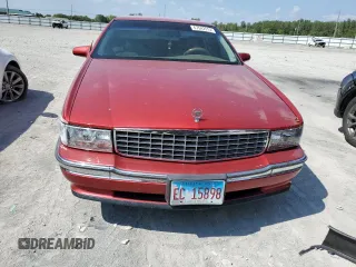 1995 Cadillac DeVille z VIN 1G6KD52B5SU263656, wystawiony jako Copart lot #83631284 z przebiegiem Nie podano mil oraz Szkoda całkowita • Salvage title. Historia ofert i sprzedaży dostępna na DreamBid. Obrazek 5.