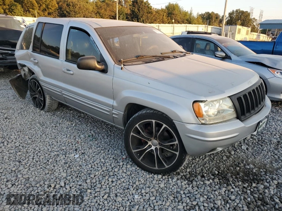 2004 Jeep Grand Cherokee with VIN 1J8GX58J54C284761, listed as a Copart auction lot 75614854 with 182,188 mi miles and Salvage title. Bid and sale history available at DreamBid. Image 4.