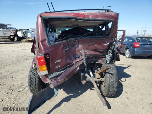 2000 Jeep Cherokee Police with VIN 1J4FF48S3YL141168, listed as a Copart auction lot 71612494 with NaN miles and Salvage Title. Bid and sale history available at carsss.com. Image 6.