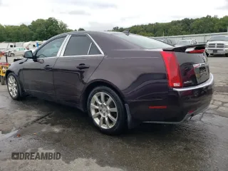 2009 Cadillac CTS RWD with VIN 1G6DV57V490111006, listed as a Copart auction lot 66313174 with 148,467 mi miles and Salvage Title. Bid and sale history available at DreamBid. Image 2.