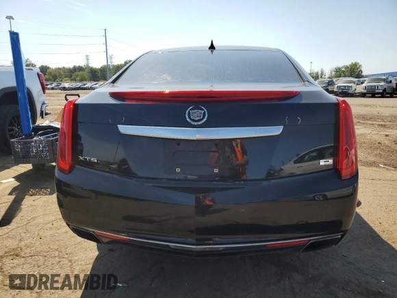 2013 Cadillac XTS Luxury z VIN 2G61P5S35D9172074, wystawiony jako Copart lot #71996124 z przebiegiem 122 338 mil mil oraz Szkoda całkowita • Salvage title. Historia ofert i sprzedaży dostępna na DreamBid. Obrazek 6.