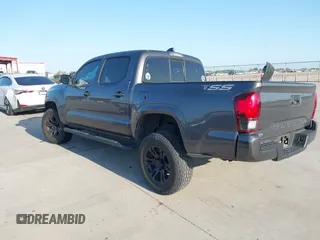 2021 Toyota Tacoma SR with VIN 3TYAX5GN5MT032481, listed as a IAAI auction lot 41979320 with 51,843 mi miles and . Bid and sale history available at DreamBid. Image 3.