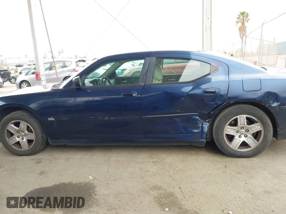 2006 Dodge Charger with VIN 2B3KA43G66H414461, listed as a IAAI auction lot 42067616 with 191,724 mi miles. Bid and sale history available at carsss.com. Image 14.