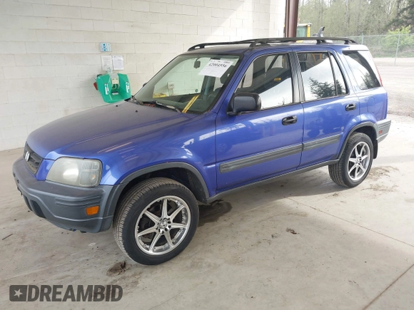 2001 Honda CR-V LX with VIN JHLRD28451C005857, listed as a IAAI auction lot 42004556 with 211,403 mi miles. Bid and sale history available at carsss.com. Image 17.