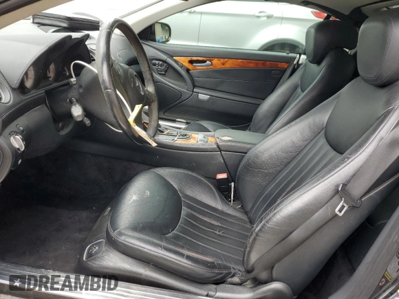 2009 Mercedes-Benz SL 550 with VIN WDBSK71F09F143389, listed as a Copart auction lot 49651665 with 110,204 mi miles and Salvage title. Bid and sale history available at DreamBid. Image 7.